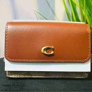 Brown Coach Boutique Leather Wallet with Gold Accent